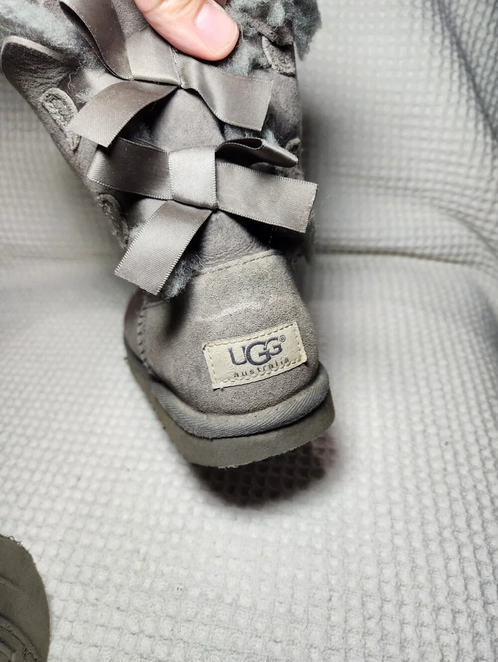 UGG Gray Bow Back Shearling Boots Flawed